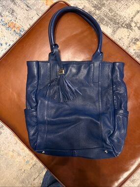 Rich blue,  B McKowski purse. Soft leather, easy to wear. Like new w/dust bag.